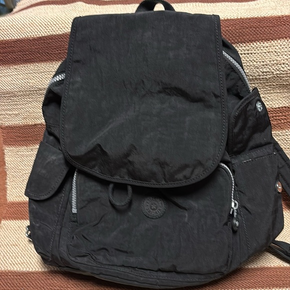 Kipling Black Backpack.  Silver zippers and buckles - Picture 1 of 7